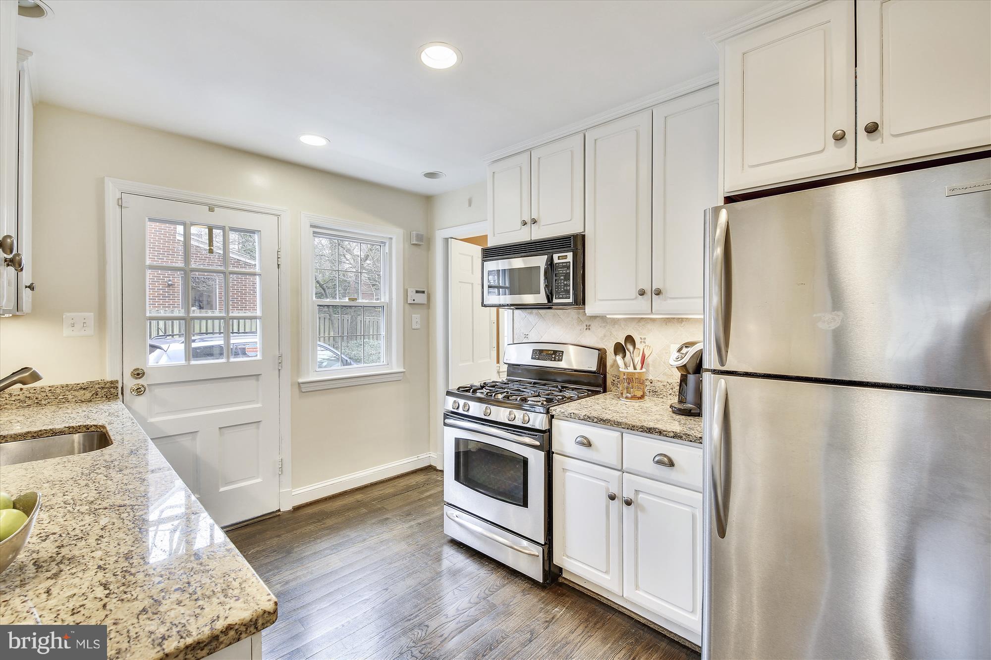 6121 Ramsgate Road Bethesda, MD 20816 - Photo 9 of 30 Kitchen offers convenient driveway access.