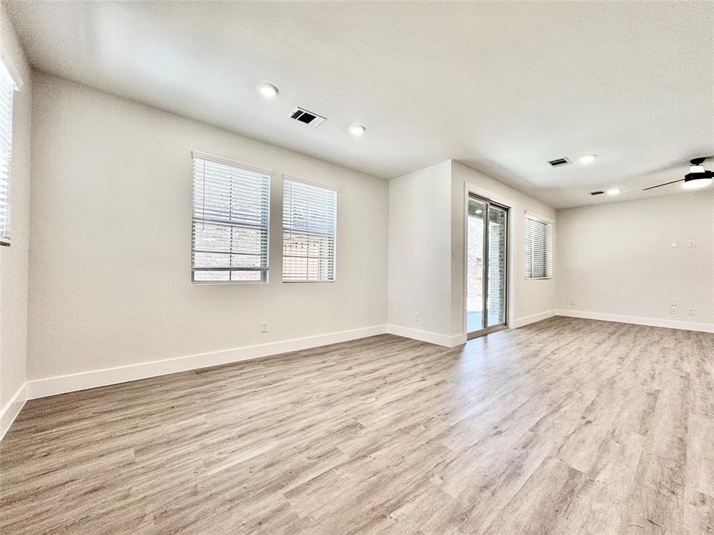 8509 Shorehan Road The Colony, TX 75056 - Photo 9 of 33 Spare room featuring light wood-style flooring, baseboards, recessed lighting, and a ceiling fan