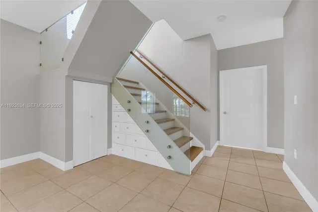 a view of entryway and hall with a window