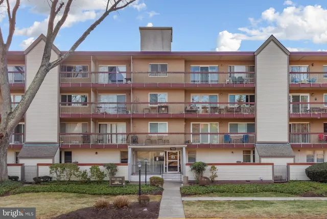 a front view of a building with balcony