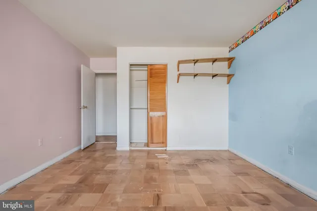 a kitchen with a stove top oven and sink
