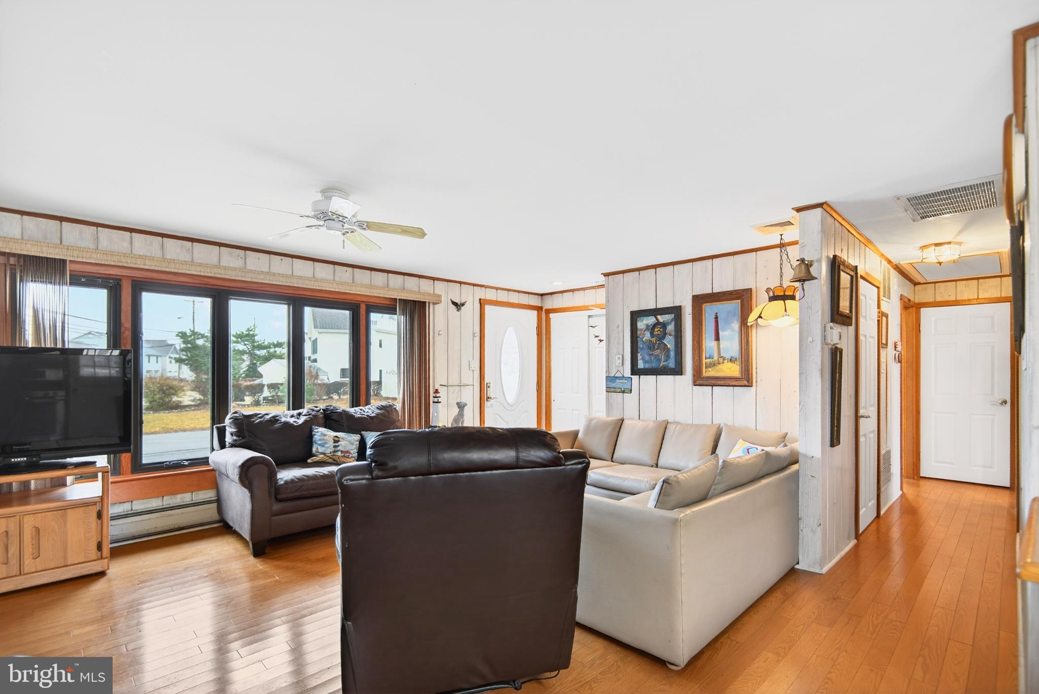 4 Rona Lane Manahawkin, NJ 08050 - Photo 15 of 28 a living room with furniture and a flat screen tv