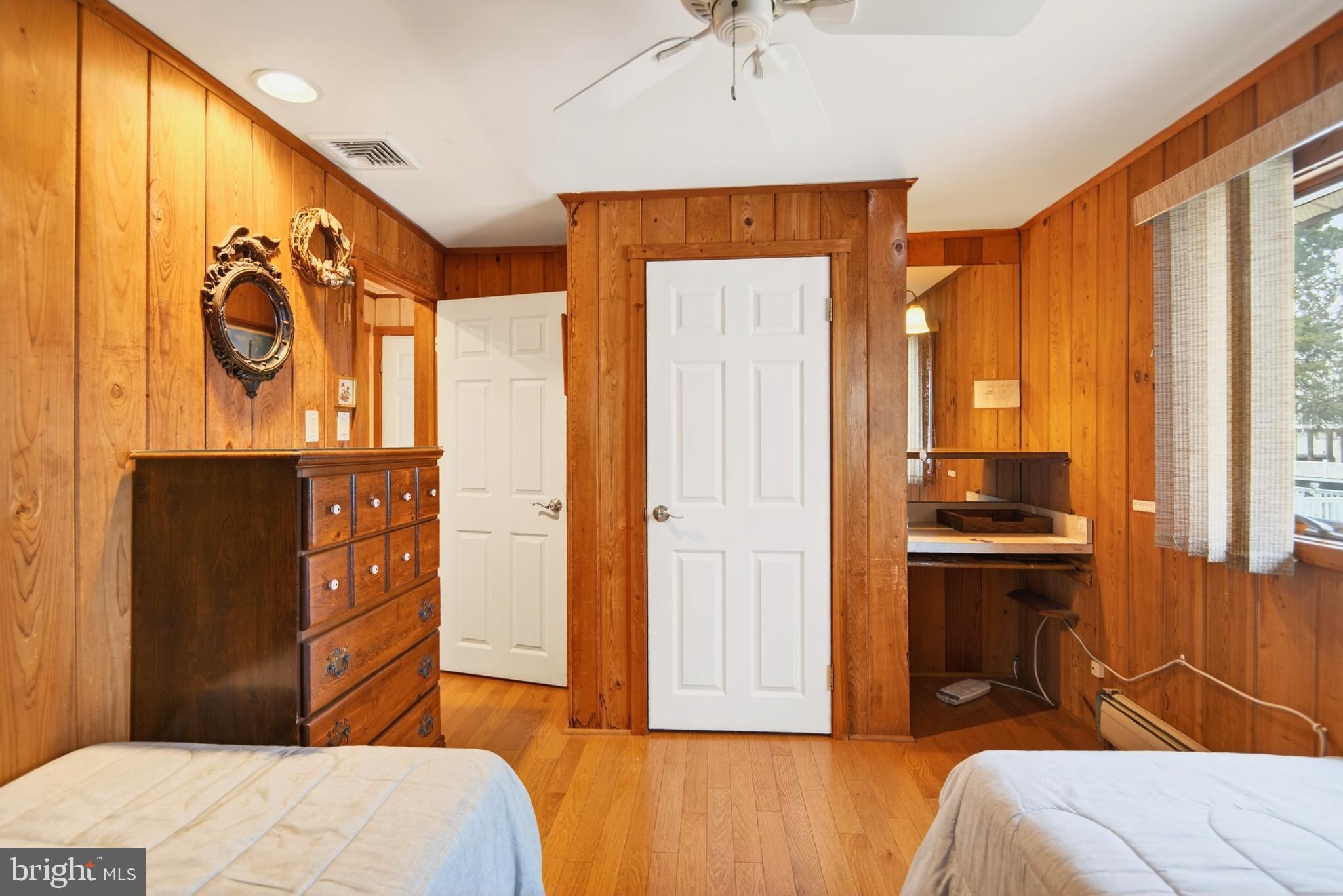 4 Rona Lane Manahawkin, NJ 08050 - Photo 22 of 28 a bedroom with a bed and a dresser