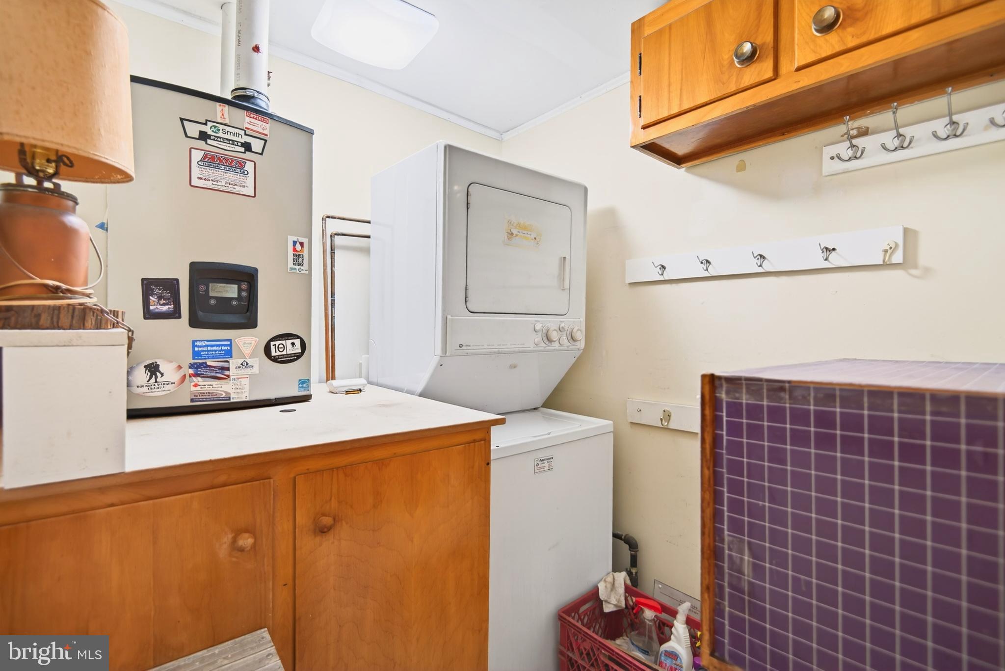 4 Rona Lane Manahawkin, NJ 08050 - Photo 28 of 28 a bathroom with a sink a vanity and a mirror