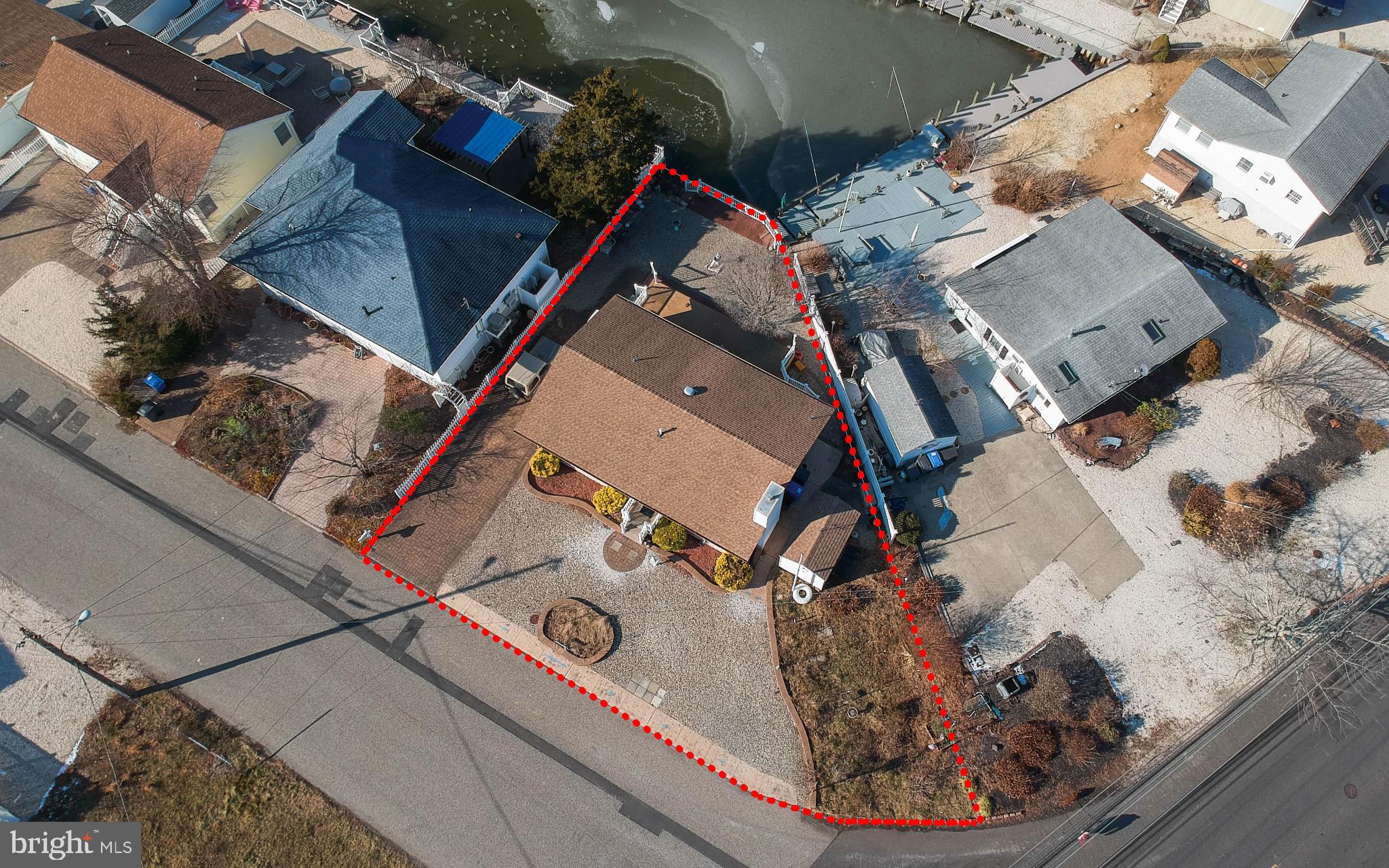 4 Rona Lane Manahawkin, NJ 08050 - Photo 5 of 28 an aerial view of a house with a backyard