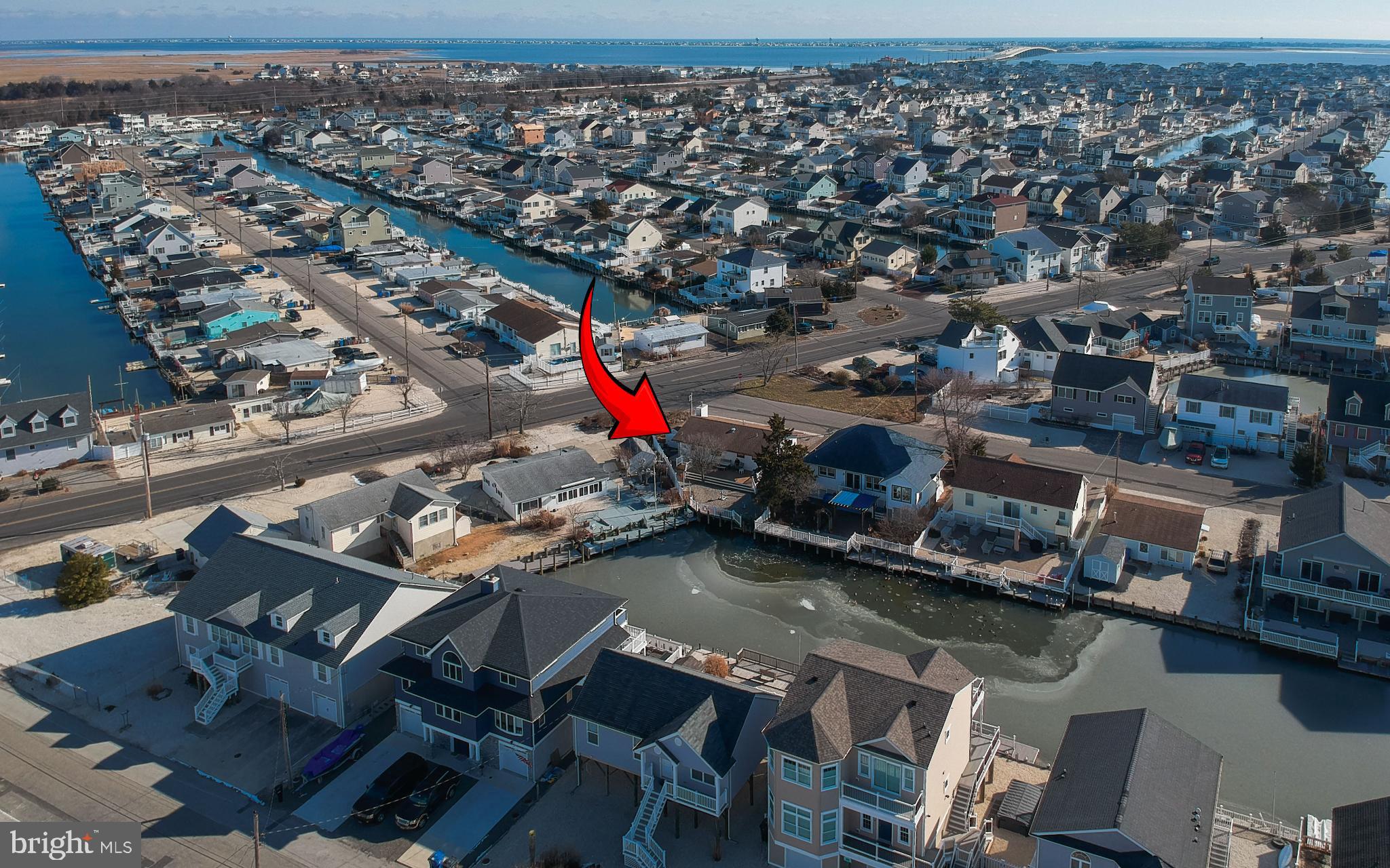 4 Rona Lane Manahawkin, NJ 08050 - Photo 7 of 28 an aerial view of a house with swimming pool and outdoor seating