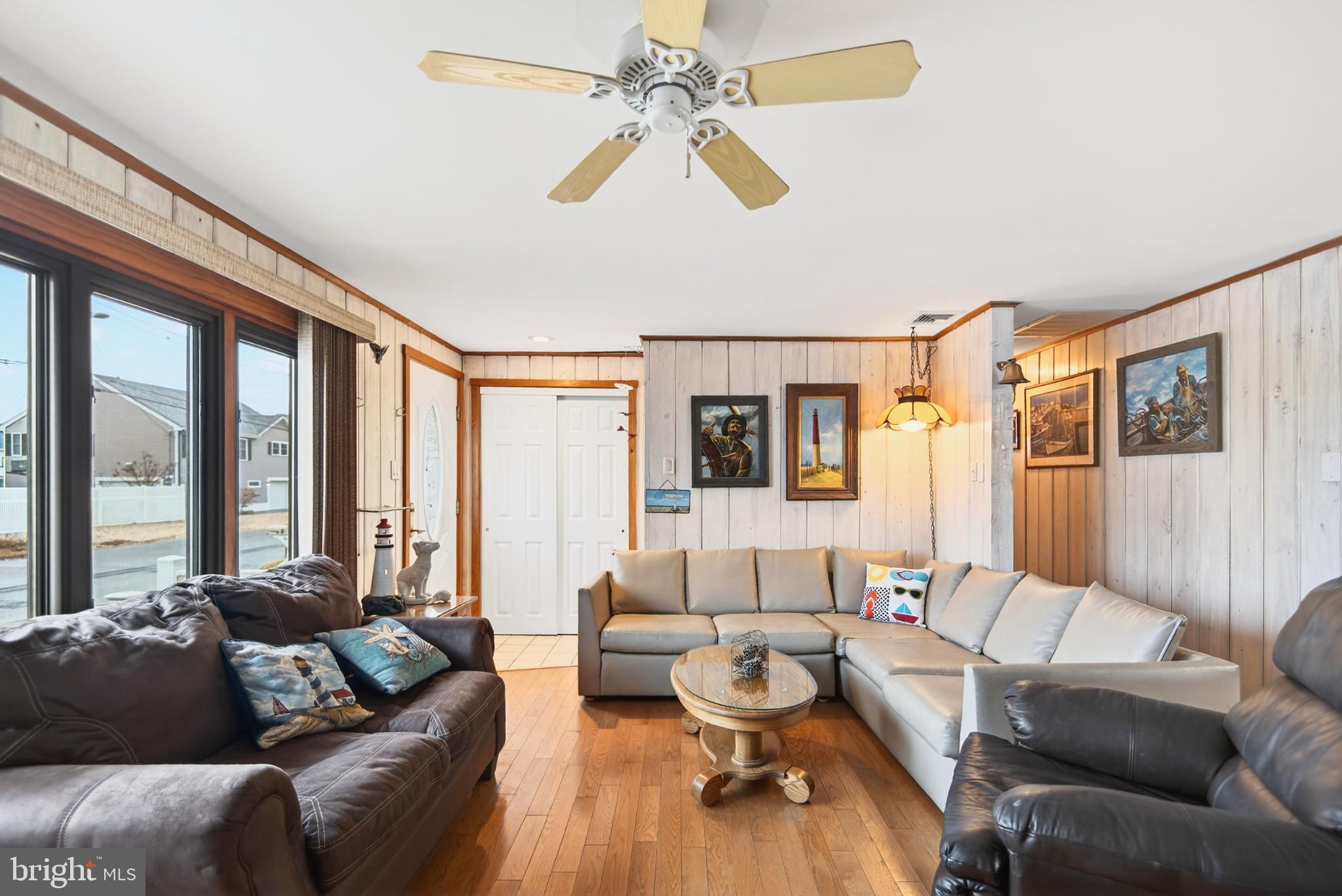 4 Rona Lane Manahawkin, NJ 08050 - Photo 9 of 28 a living room with furniture and a large window