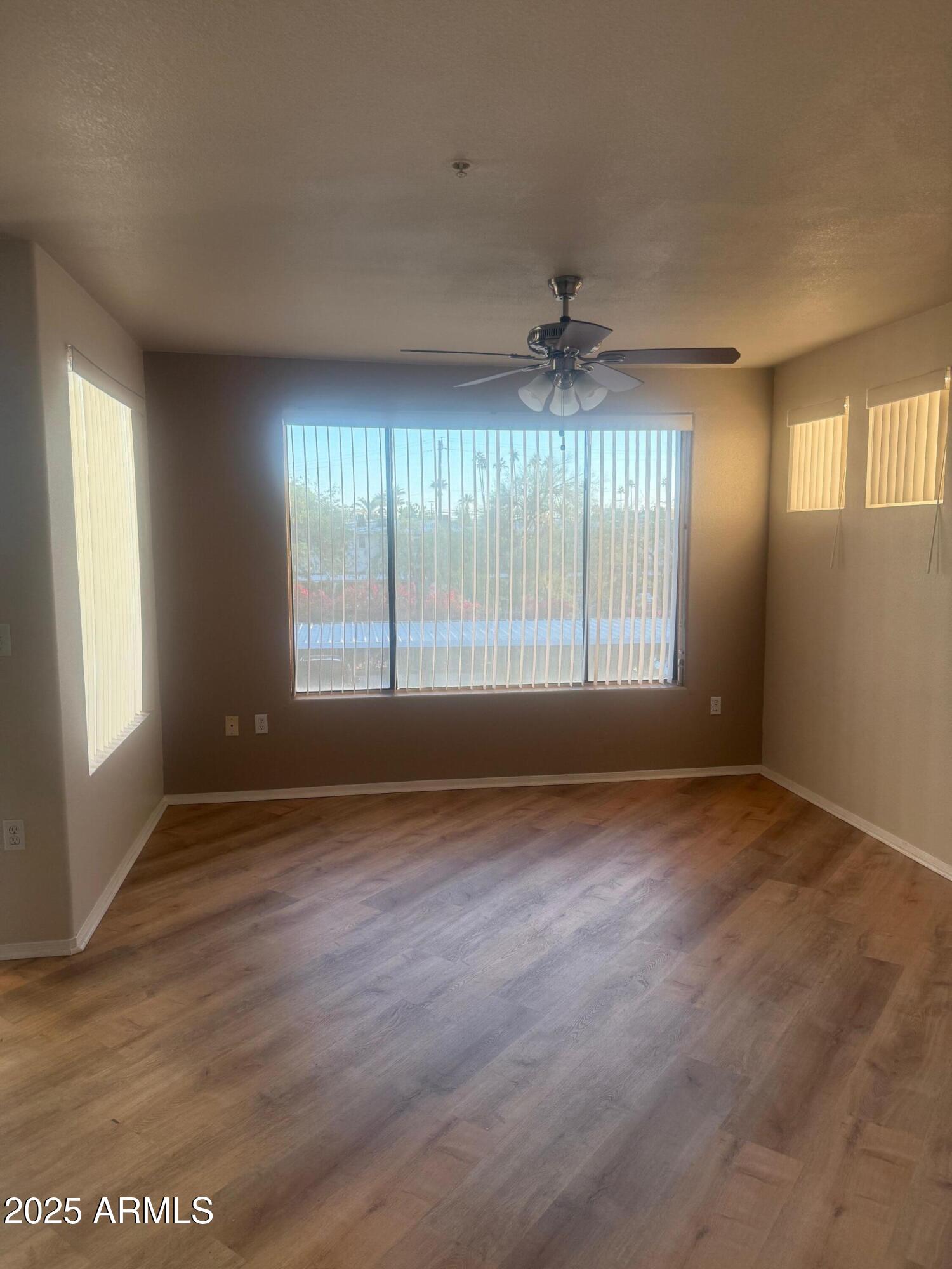 3848 North 3rd Avenue, Unit 2071 Phoenix, AZ 85013 - Photo 11 of 31 a view of an empty room with a window
