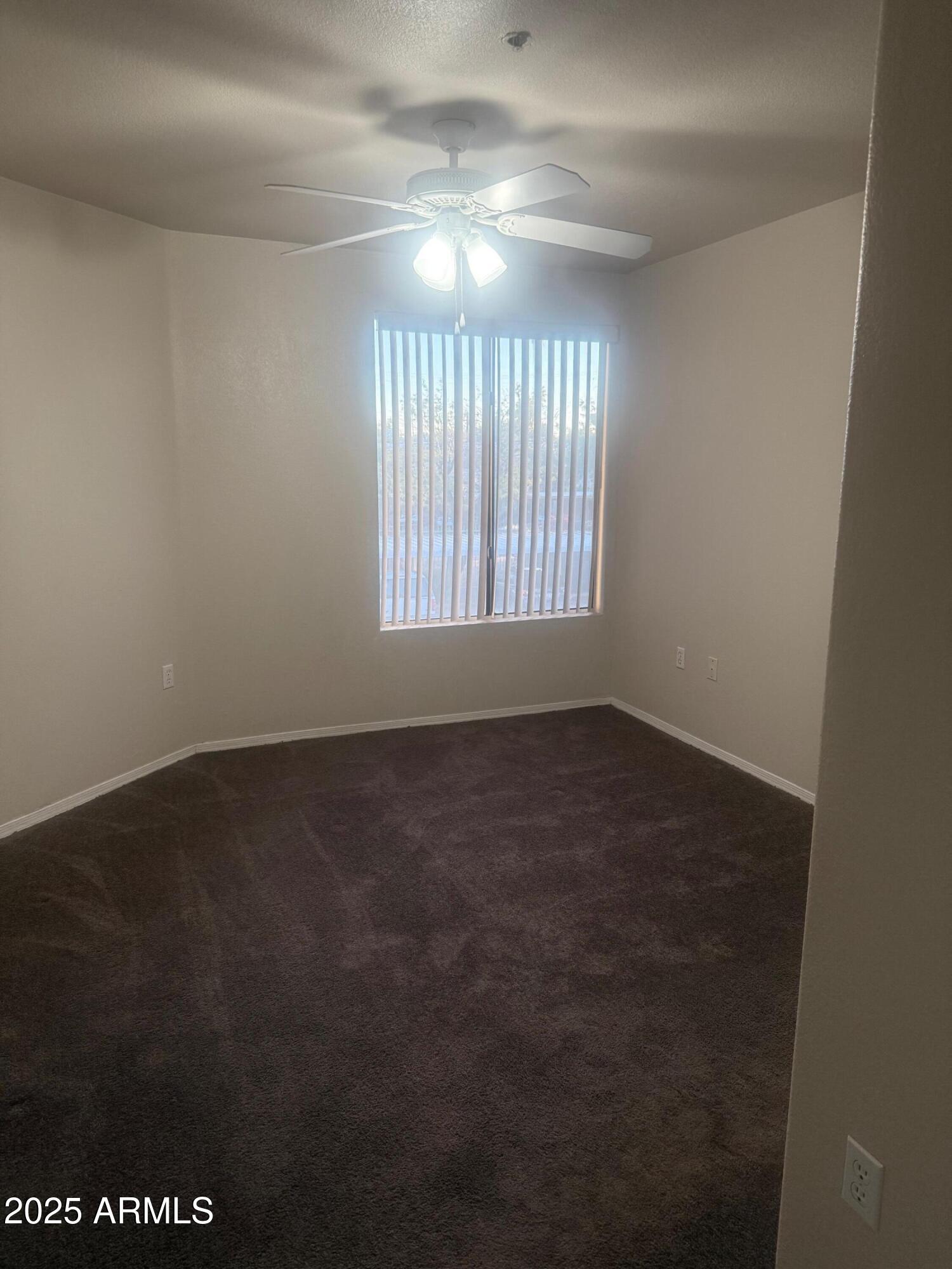 3848 North 3rd Avenue, Unit 2071 Phoenix, AZ 85013 - Photo 19 of 31 an empty room with a window