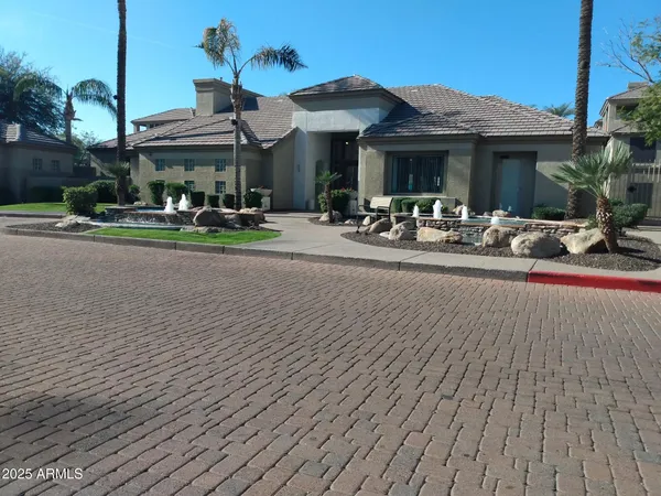 a view of a building with sitting area