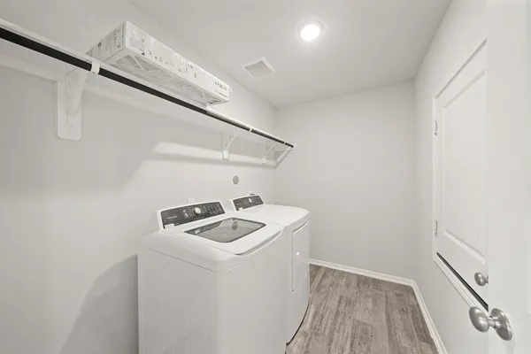 a bathroom with a granite countertop sink a toilet a shower and a mirror