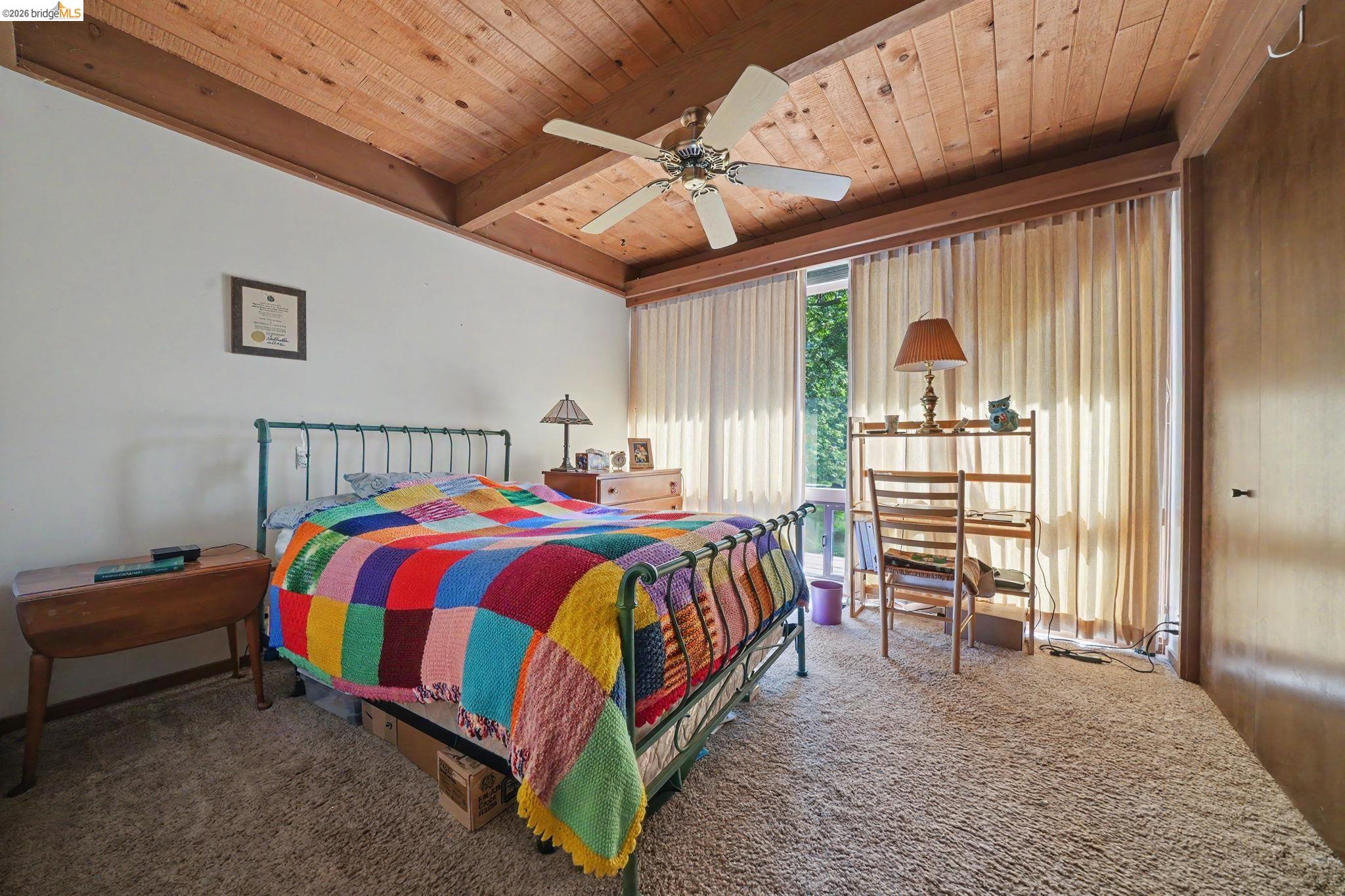 6161 Fullen Road Murphys, CA 95247 - Photo 42 of 53 a bed sitting in a spacious bedroom next to a window