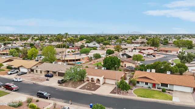 an aerial view of a city with lots of residential buildings
