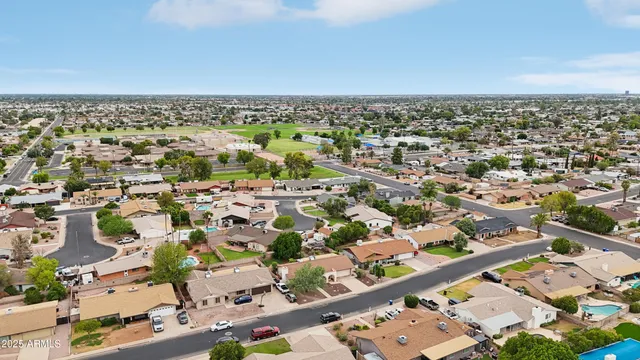 a picture of a wall with a white building