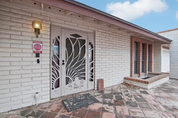 a front view of a house with parking space