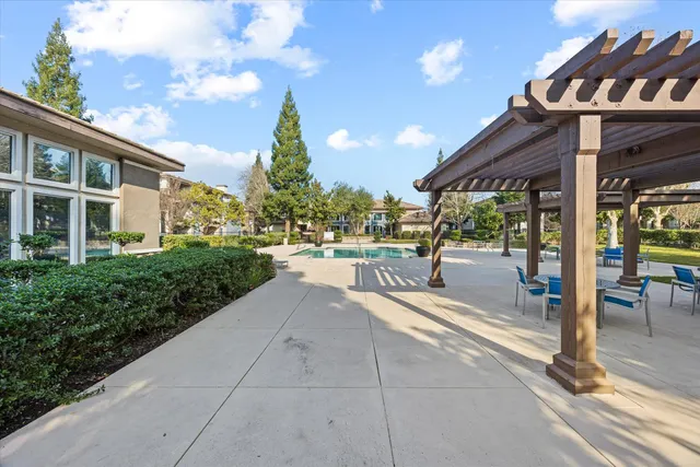 a view of a building with a garden
