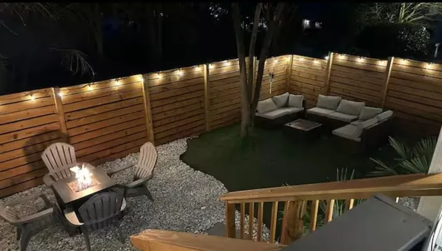 a view of outdoor space with a garden and patio