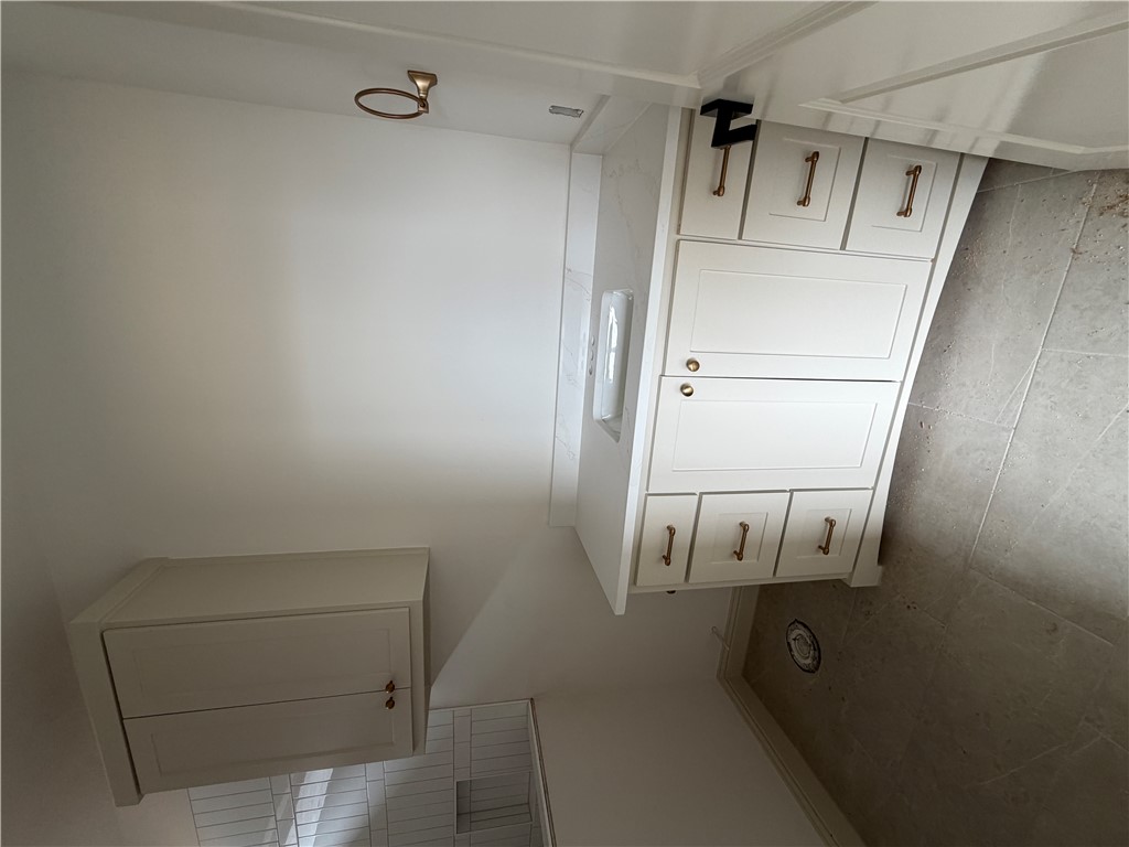 5107 Greenstone Way Bryan, TX 77802 - Photo 18 of 22 a view of an empty walk in closet