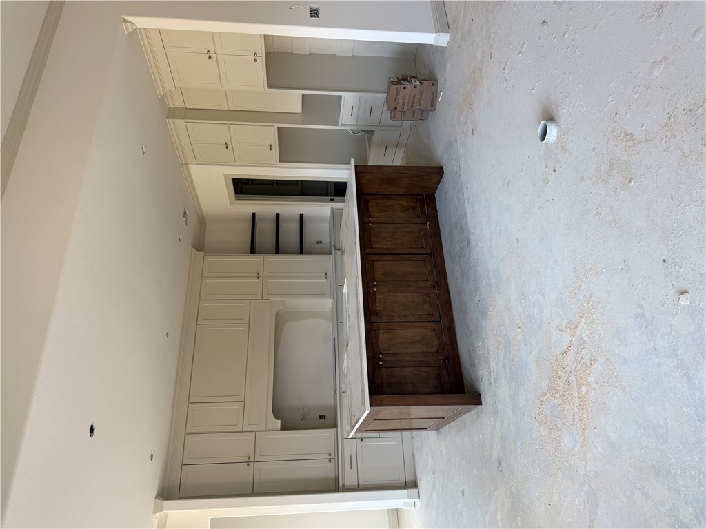 5107 Greenstone Way Bryan, TX 77802 - Photo 4 of 22 a view of kitchen with furniture and cabinet