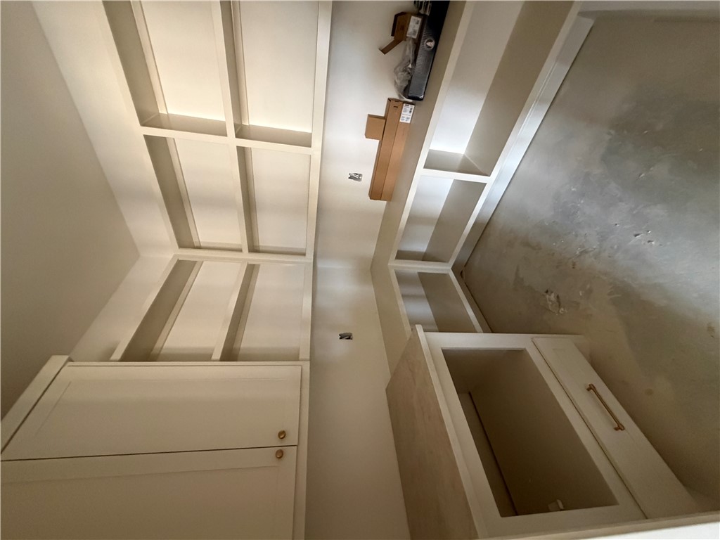 5107 Greenstone Way Bryan, TX 77802 - Photo 5 of 22 a view of an empty room with a fireplace and a window