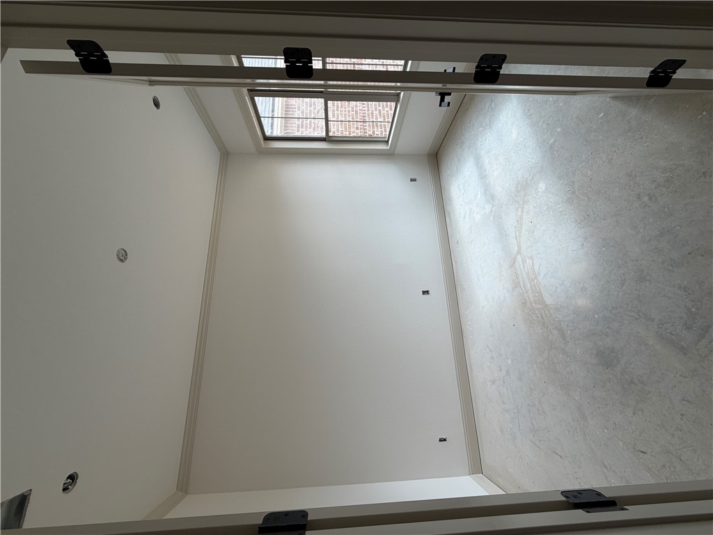 5107 Greenstone Way Bryan, TX 77802 - Photo 10 of 22 a view of an empty room with a window