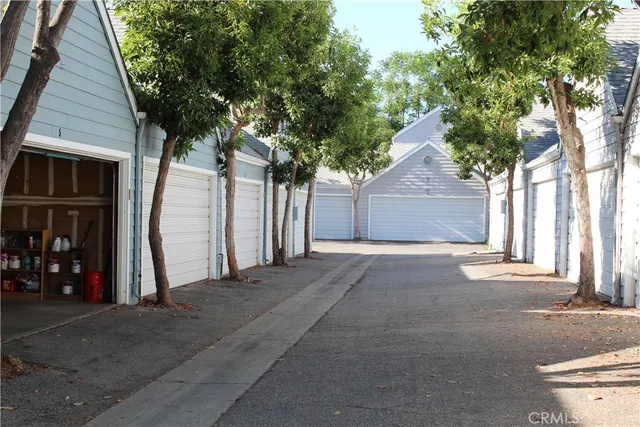 a view of a chair and tables in the patio