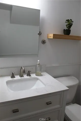 a bathroom with a sink and a toilet