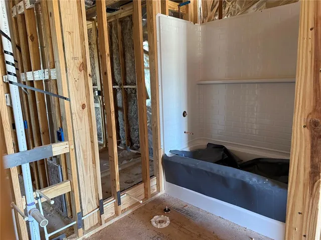 a front view of a building with glass windows and door