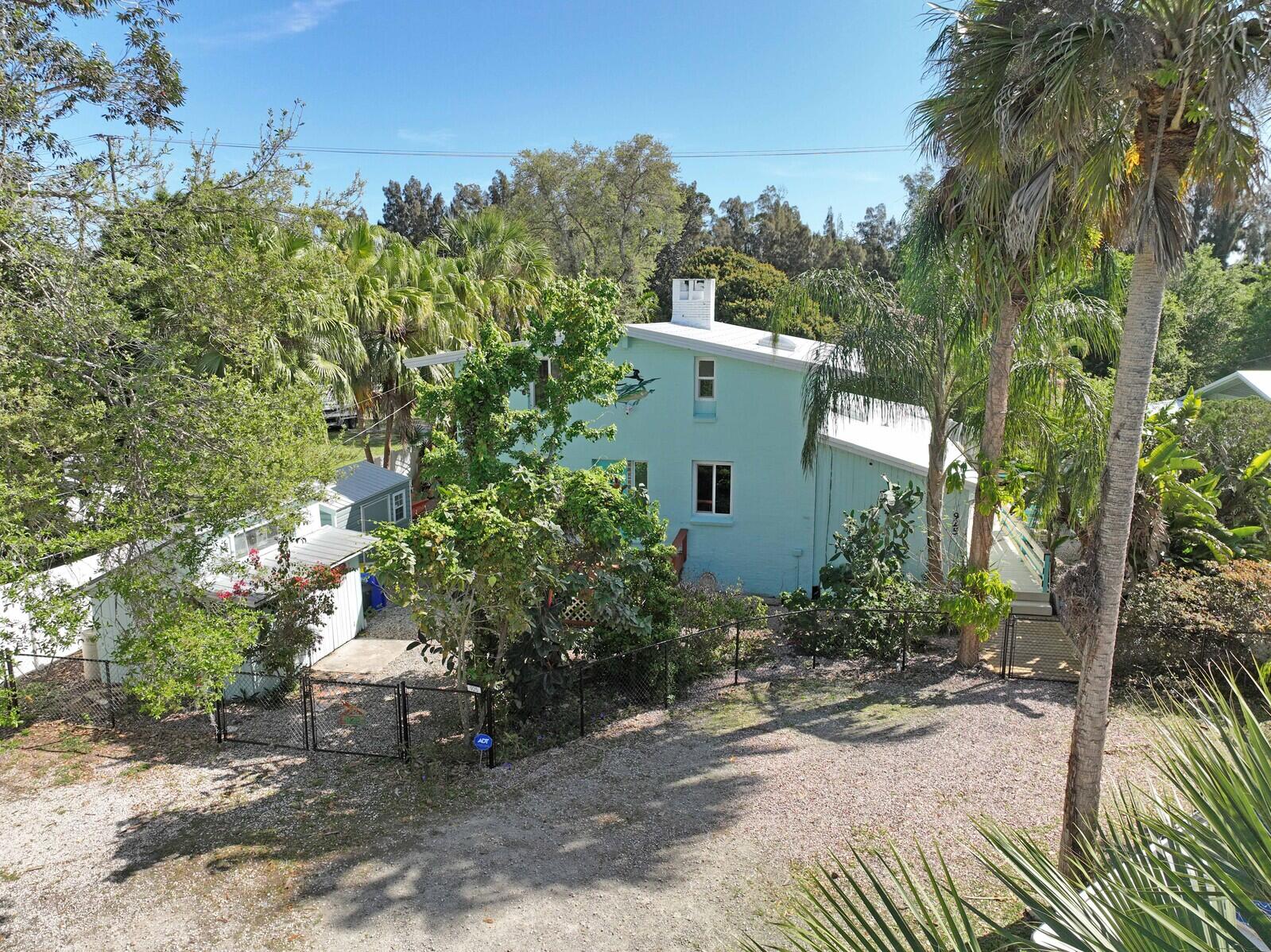 925 Southwest Rustic Circle Stuart, FL 34997 - Photo 1 of 43 Front of home