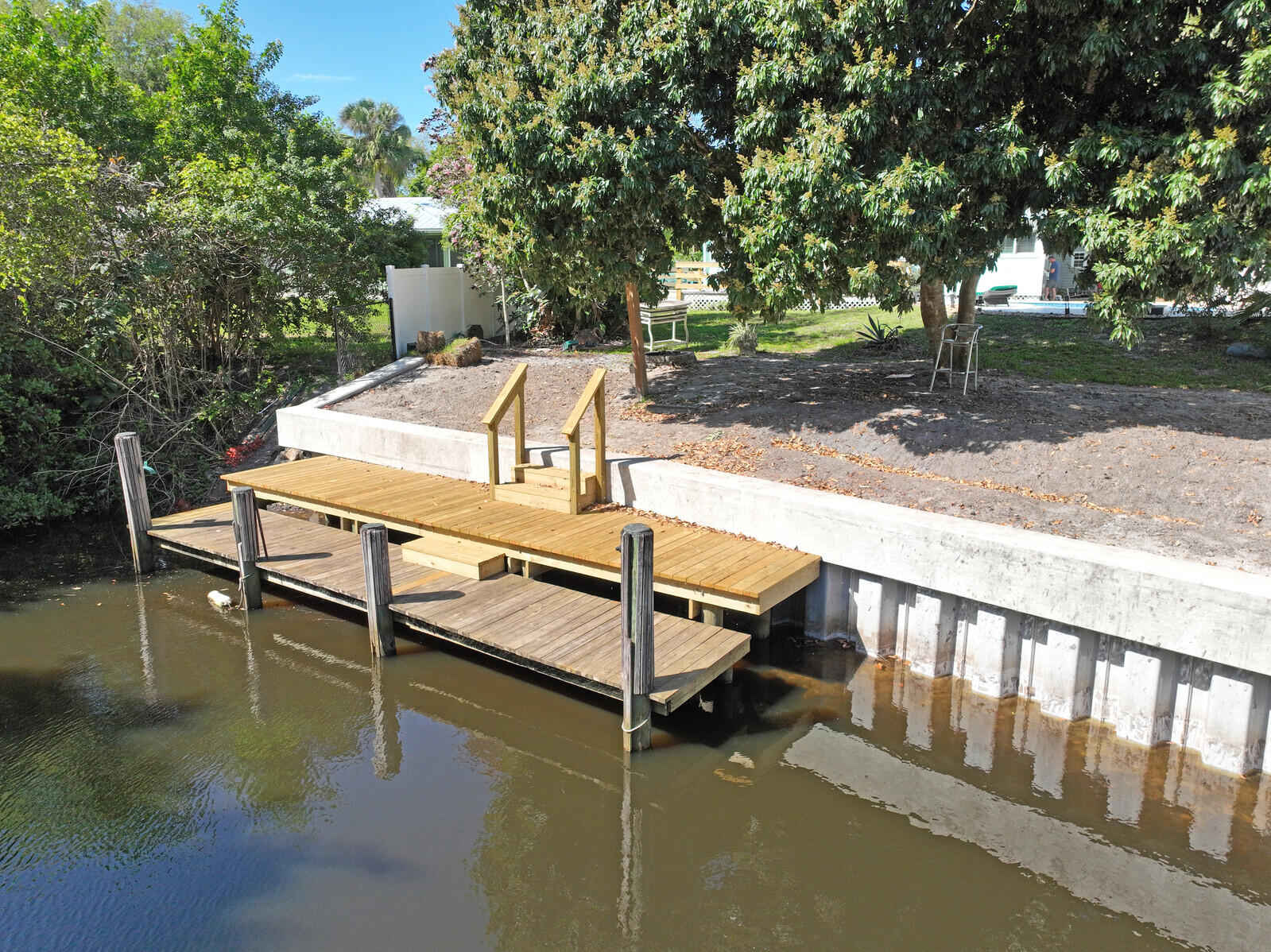 925 Southwest Rustic Circle Stuart, FL 34997 - Photo 13 of 43 New Seawall and dock