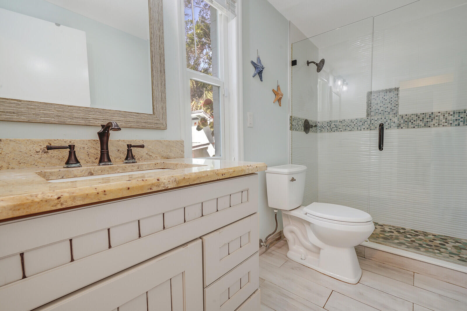 925 Southwest Rustic Circle Stuart, FL 34997 - Photo 34 of 43 Guest bathroom downstairs