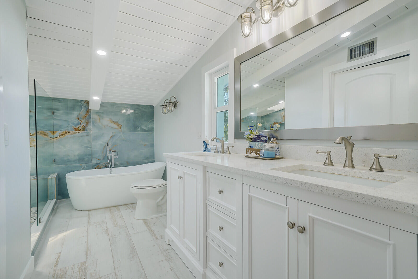 925 Southwest Rustic Circle Stuart, FL 34997 - Photo 41 of 43 Remodeled Primary Bathroom