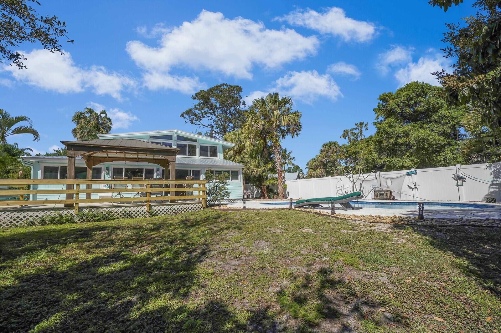 925 Southwest Rustic Circle Stuart, FL 34997 - Photo 8 of 43 Backyard view