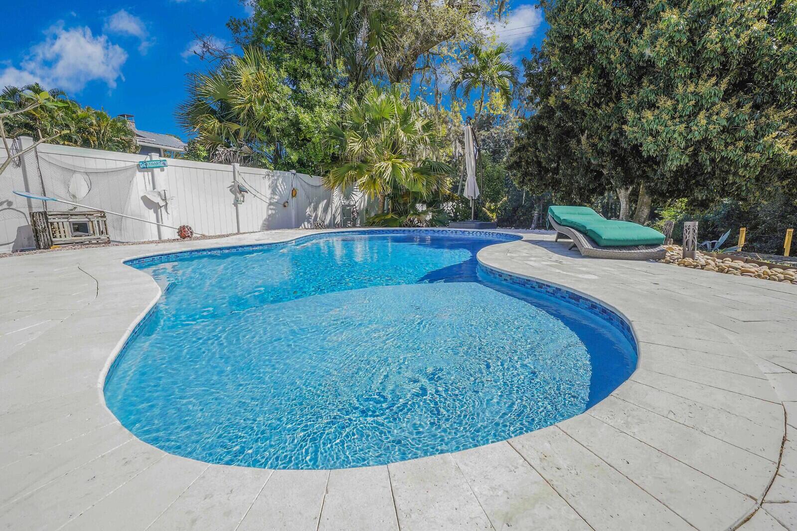 925 Southwest Rustic Circle Stuart, FL 34997 - Photo 10 of 43 Salt chlorination and heated pool