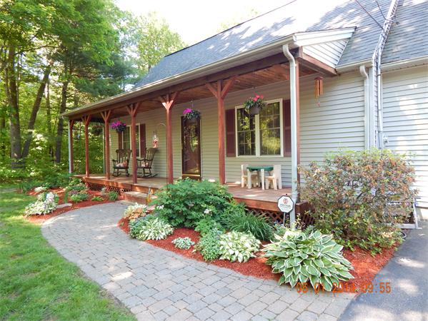 484 Reed Street Warren, MA 01092 - Photo 3 of 30 front view of a house with a yard