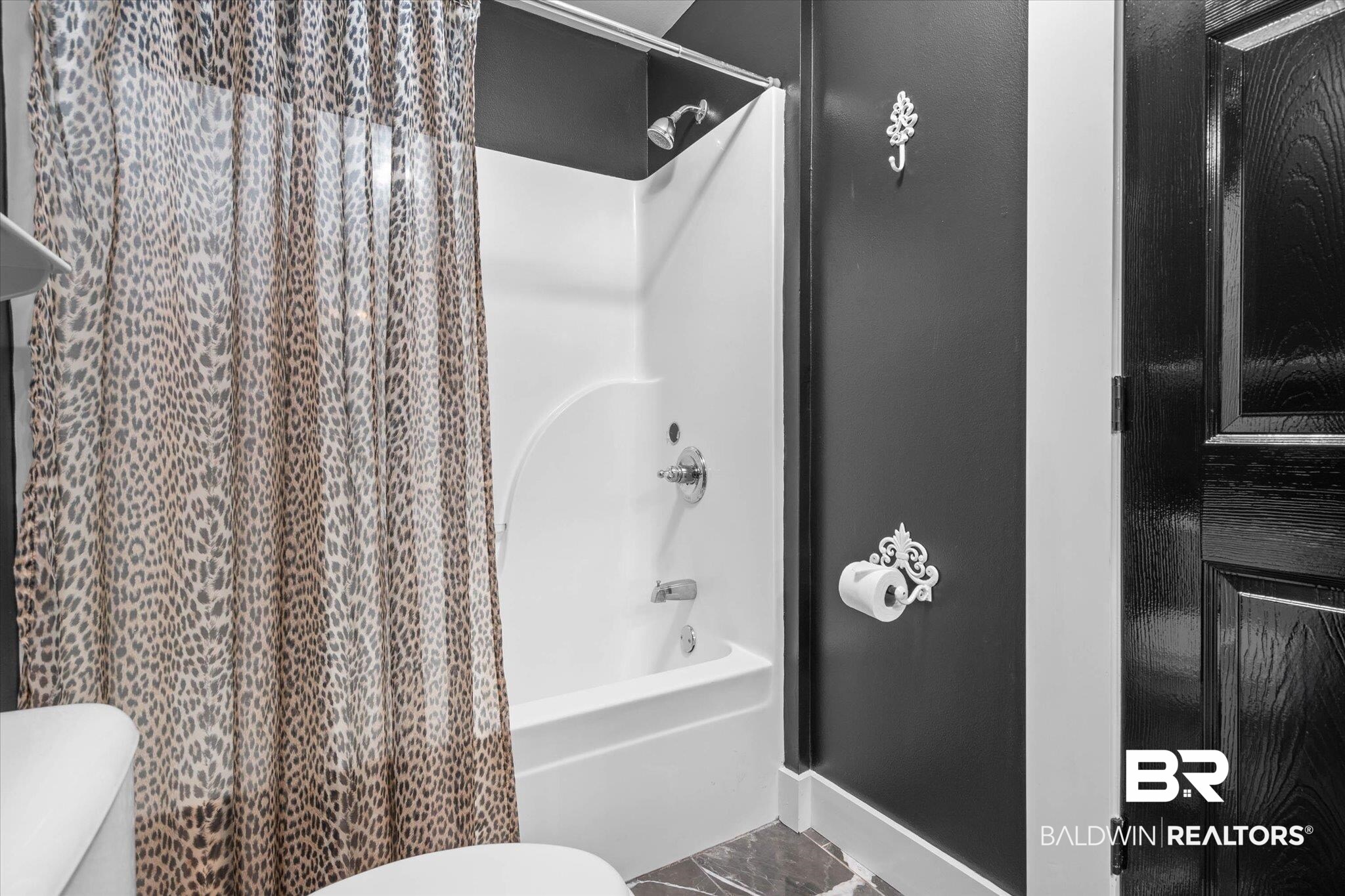 3216 Bay Booster Club Road Theodore, AL 36582 - Photo 20 of 46 Bathroom with toilet and shower / bath combination with curtain