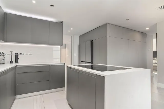 a bedroom with a large bed and a balcony view