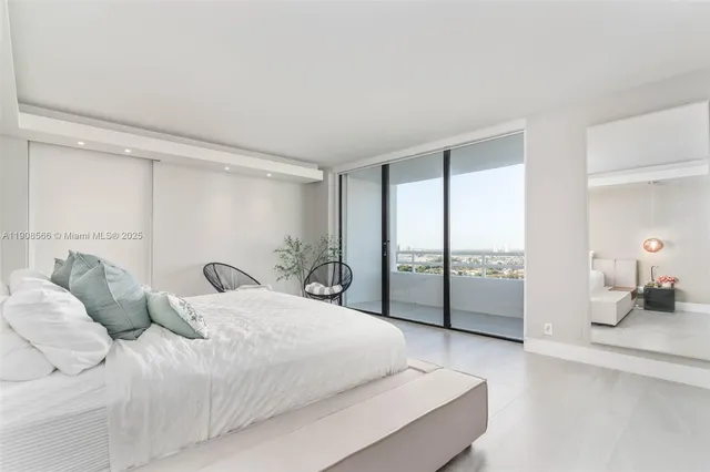 a bedroom with a bed and a table