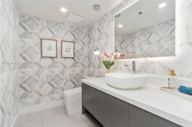 a bedroom with bed and a window