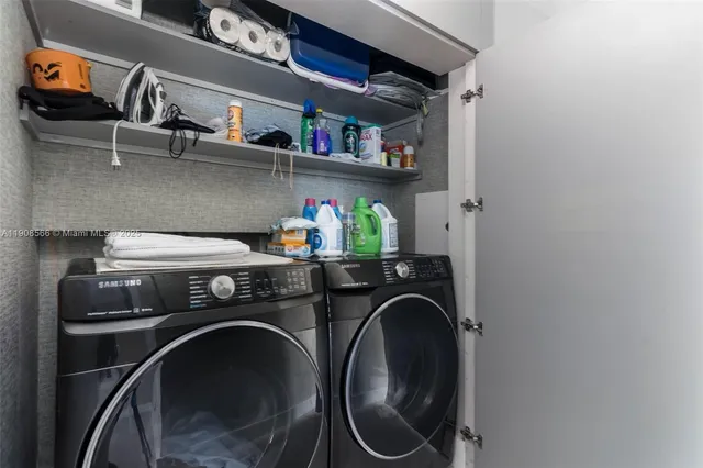 a couple of cars parked in front of a building