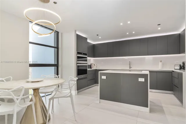 a view of a kitchen with a sink