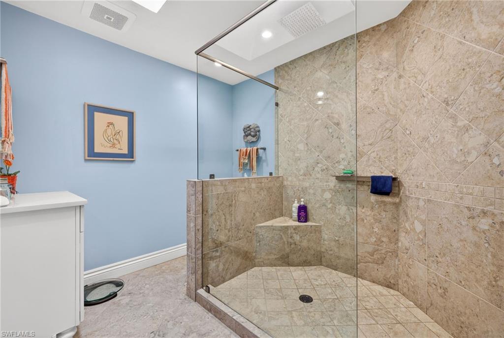 4030 Crayton Road, Unit C2 Naples, FL 34103 - Photo 25 of 32 a bathroom with a shower