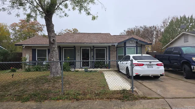 a car parked in front of a house