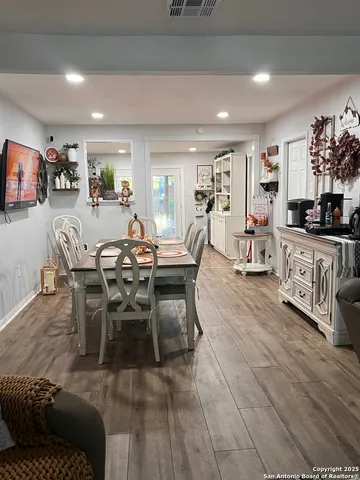 a view of a dining room with furniture