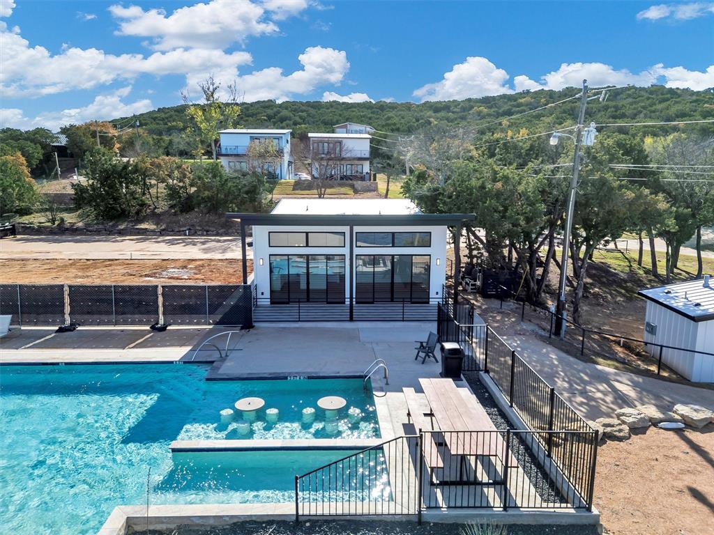 1782 Fm 2951, Unit 28 Graford, TX 76449 - Photo 1 of 30 a view of a big yard with plants and large trees