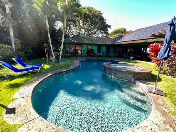 an outdoor space with wooden floor