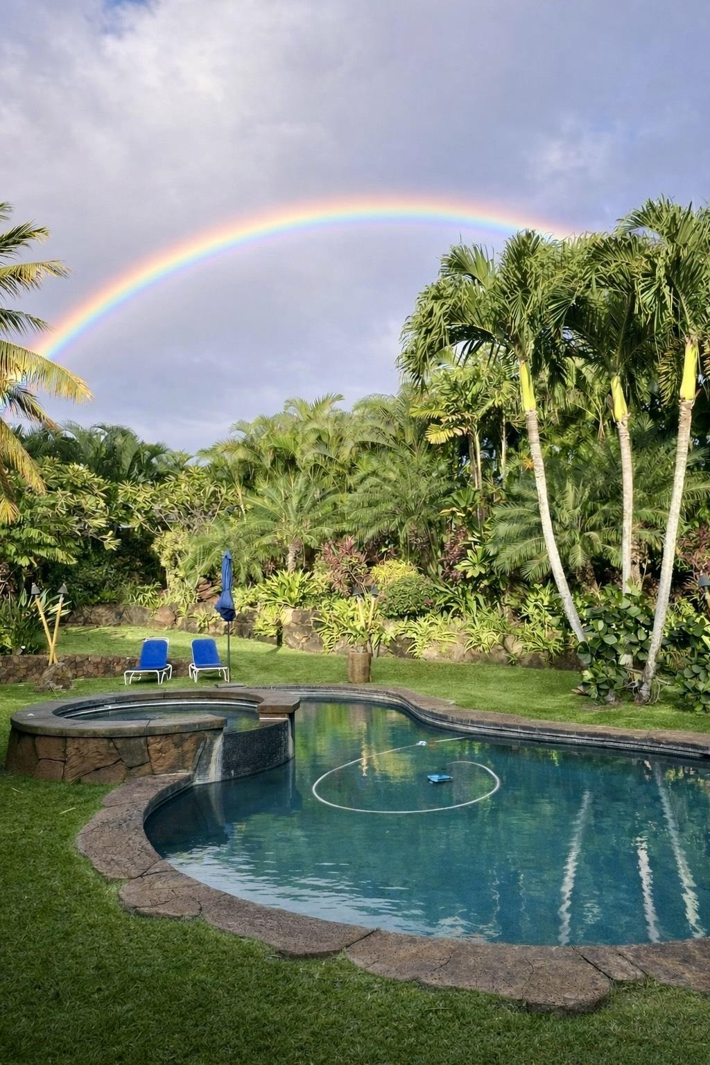 4800 Lower Honoapiilani Road Lahaina, HI 96761 - Photo 49 of 50 a view of a swimming pool with a yard