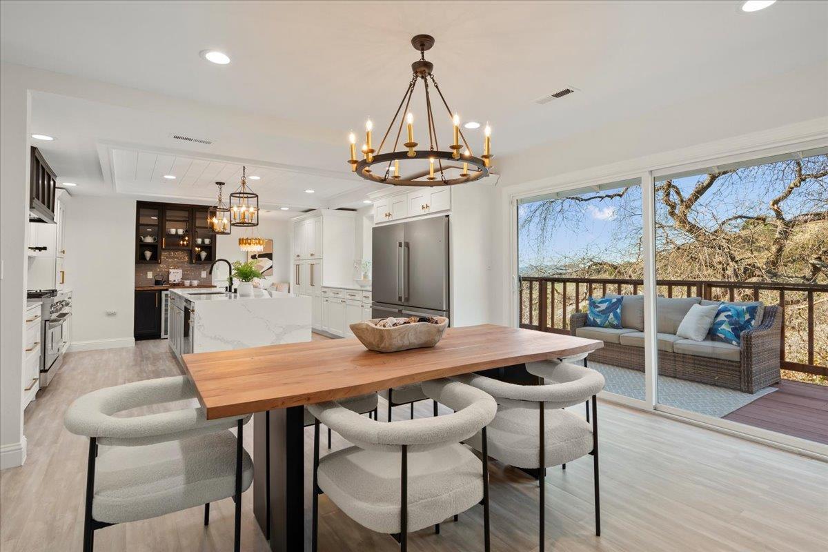 2915 Thomas Grde Morgan Hill, CA 95037 - Photo 15 of 87 a view of a dining room with furniture window and wooden floor