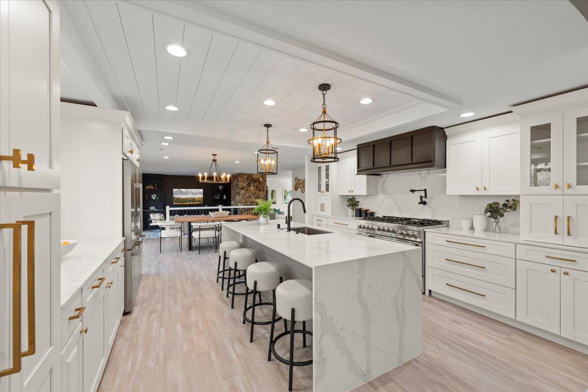 2915 Thomas Grde Morgan Hill, CA 95037 - Photo 16 of 87 a kitchen with appliances a sink a counter top space and cabinets