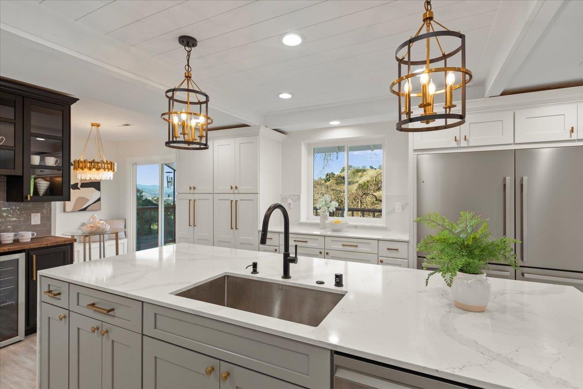 2915 Thomas Grde Morgan Hill, CA 95037 - Photo 17 of 87 a kitchen with a refrigerator and a sink